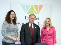 photo of Drake students Melanie Paullin-Castro and Anne Wetzel with PRovost Ron Troyer at press conf