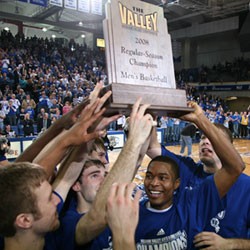 Photo of Drake players with MVC Championship trophy