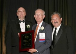photo of Rick Morrow, 2007-08 IPA President Jay Currie, and Tom Temple, IPA’s executive vice preside