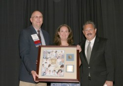 photo of Anisa Fornoff (middle), 2007-08 IPA President Jay Currie, and Tom Temple, IPA’s executive v