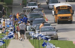 photo of people moving students into dorms