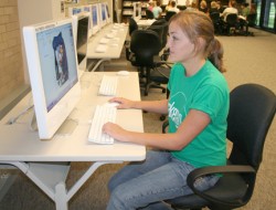 Photo of student working in media lab