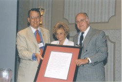 Photo of Maddie Levitt accepting a national award.