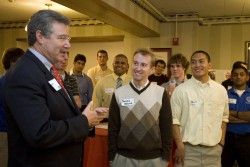 photo of Barry Posner visiting with students