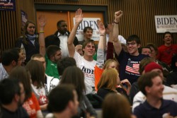 photos of voters during caucus