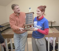 photo of Kelly Donovan accepting first-place trophy