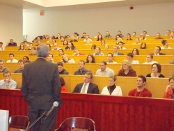 photo of students listening to visiting professor and former deputy attorney general for the state o
