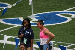 photo of Deidre Howard interviewing an athlete at Relays last year