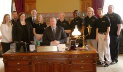 photo of Law students and members of Elevate surrounding Gov. Culver.