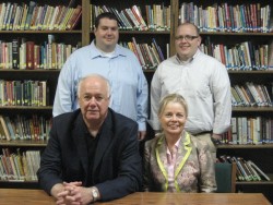 photo of Jason Yates, Dustin Miller and Barry and Michelle Griswell talk about the development proje