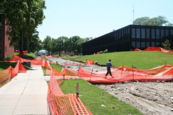 photo of person walking across bridge on 28th near Forest Avenue