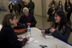 Azar Nafisi autographs books after the lecture