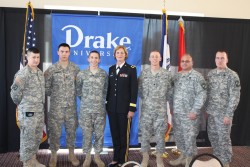 Brig. Gen. Phipps poses with members of Drake ROTC at Let's DU Lunch.