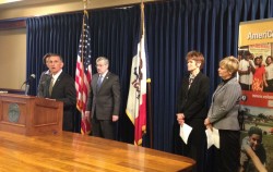 Shannon Cofield (far right), senior counsel to the president for strategic partnerships, attended the press conference on behalf of the University. 