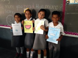 USA National Honor Society students researched, illustrated and bond books for students in Belize.  