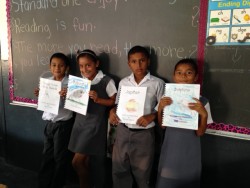 Books created for Belize students include topics such as the human body, animals and planets.  