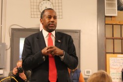 Ben Carson answers a few questions for an an overflow audience that included several Drake University students at Northside Cafe in Winterset, Iowa. / Photo courtesy www.iowacaucusproject.org