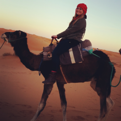 Taylor Donaldson rides a camel in the Sahara Desert while studying abroad in Morocco for the spring 2014 semester. Donaldson is one of two Drake students to receive a Fulbright Scholarship this year; she will teach English in Morocco.