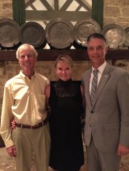 Ric, ED’70 and Debbie Scripps, ED '72, meet with President Martin at a Leader of the Pack event in Dallas.