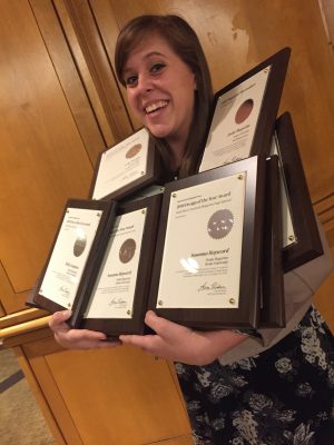 Katie Bandurski, 2016-17 Drake Magazine editor, brings home the Pacemaker hardware. 