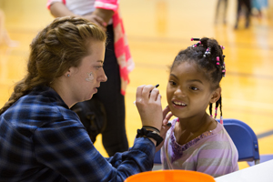 Girl participates in face-painting