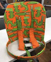 Adapted backrest for an exersaucer