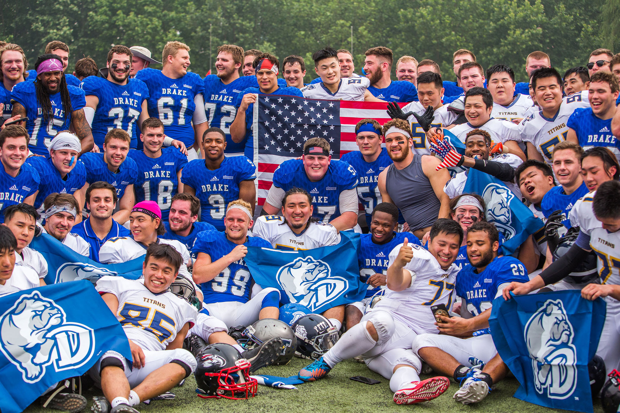 Football Team Takes In Baseball Game - Drake University Athletics