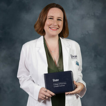 Third-year student pharmacist Abigail Stumpner poses for a portrait at the 2021 White Coat Ceremony for Drake University's College of Pharmacy and Health Sciences.
