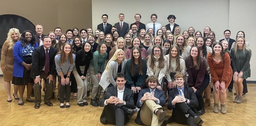 Student, faculty, and alumni members of Phi Delta Chi's Psi Chapter at Drake pose for a photo during its 18th annual Awards Banquet on Nov. 6, 2023.