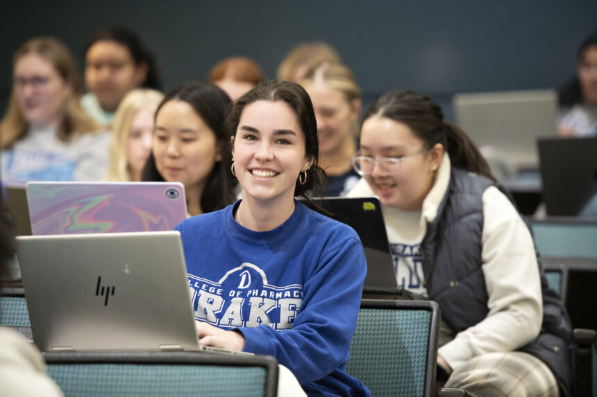 Drake Health Sciences student works on her laptop during a lecture